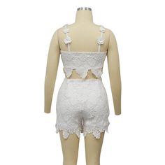 Indulge in luxury with our Feminine Lace Applique' Shorts Set. Featuring delicate lace appliques, this set exudes elegance and sophistication. Perfect for a romantic evening or a special occasion, this set will make you feel confident and stylish. Elevate your wardrobe with this exclusive piece. Sizes S-2XL Decoration Zip Up , Lace Length Above Knee, Mini Style Sexy & Club Fabric Type Blended fabrics , Lace Material Polyester , Spandex Neckline Strappy Pattern Type Solid Sleeve Length Sleeveless Season Summer Fabric Non-Stretch Black Jumpsuit Dress, Curvy Lingerie, Lace Material, Romantic Evening, Curvy Dress, Crop Top Sweater, Summer Fabrics, Short Set, Basic Tops