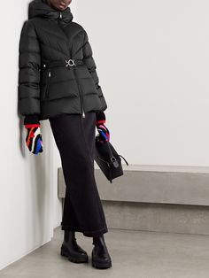 Just as suited for wearing in the mountains or the city, Moncler's 'Brosse' jacket balances practicality and style. It's made from quilted shell that's filled with insulating down and feathers and has a generous hood. The waist-cinching belt features the bell-shaped logo. Designer Outerwear With Detachable Hood And Long Sleeves, Designer Black Outerwear With Padded Collar, Designer Long Sleeve Puffer Jacket For Winter, Luxury Long Sleeve Winter Puffer Jacket, Modern Fitted Cold Weather Outerwear, Fitted Hooded Puffer Jacket For Workwear, Designer Black Winter Outerwear, Designer Fitted Puffer Jacket With Padded Collar, Luxury Outerwear With Detachable Hood And Long Sleeves