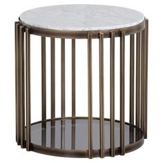 a marble top side table with metal bars on the sides and round glass shelf below it