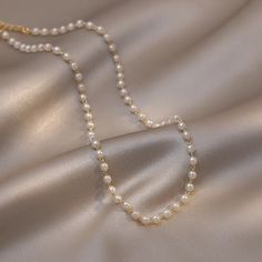 ✦ A necklace to treasure! Get this dainty pearl gold choker and be the envy of all your friends. The perfect gift for your girlfriend, mother, sister, or child. It's a subtle but eye-catching accessory that you can wear everyday.✦ Time to mix and match! Our BUY 2 GET 1 FREE promotion is live now for all fashion jewelry lovers. Pick 3 different fashion jewelry & apply BUY2GET1FREE coupon code when checking out your cart to get 1 jewelry for FREE!----------- DESCRIPTIONS ------------ Size (Length) White Pearl Necklace With Clavicle Chain As Gift, Trendy Pearl White Necklace With Clavicle Chain, Pearl White Chain Necklace With Clavicle Chain As Gift, Trendy Pearl Pendant Chain Necklace As Gift, Trendy Pearl Charm Chain Necklace Gift, Trendy Chain Necklace With Pearl Pendant For Gift, Dainty Pearl White Clavicle Chain Necklace, Pearl White Chain Necklace Gift, Trendy Pearl Charm Choker As Gift