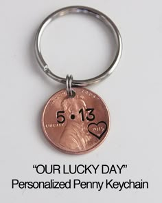 a penny keychain with the words our lucky day personalized penny key chain