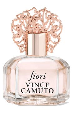 Fiori—meaning 'flowers' in Italian—is a fresh and invigorating summer scent, light and smooth, authentically uplifting. Featuring top notes of luscious pink grapefruit and ripened white nectarine, the heart of Fiori is enriched with sheer iris and dewy freesia, providing a beautiful, purifying backdrop for base notes of rich sandalwood and creamy blonde cedarwood. A soft, contemporary fragrance, Fiori embodies the independent spirit of the Vince Camuto woman.Notes: grapefruit, nectarine, freesia, iris, white cedarwood and sandalwood 0.25 oz. Made in USA Fiori Vince Camuto, Meaning Flowers, Iris White, Soft Contemporary, Creamy Blonde, Summer Scent