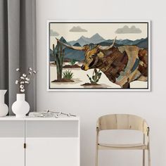 an animal painting hanging on the wall next to a chair and table with vases