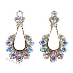 These Are Brand New Women's Iridescent Rhinestone Drop Earrings. These Beautiful Earrings Feature Sparkling Pear And Navette Cut Iridescent Rhinestones, Gold Toned Hardware, And Drop Style. All Orders Are Packaged With And Are Shipped Out Asap! Questions? Leave Us A Comment! We Are More Than Happy To Help! New To Poshmark? Use The Invite Code Dailyshopper73 When You Create Your Account For $10 Off Your First Purchase! Iridescent Jeweled Jewelry For Parties, Elegant Iridescent Sparkling Crystal Earrings, Iridescent Sparkling Earrings, Iridescent Crystal Earrings For Party, Elegant Iridescent Crystal Earrings For Pierced Ears, Iridescent Crystal Drop Earrings, Elegant Iridescent Sparkling Earrings, Sparkling Iridescent Drop Earrings, Magpie