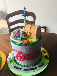 a birthday cake that is on top of a table