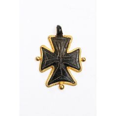 This is part of Chairish’s Fine Jewelry assortment.  A bronze cross pendant from the Byzantine Era trimmed with 21K gold. This bronze cross was likely created by lost wax casting and then further decorations are hand chiseled. The Byzantine Era ran from the 300s to the fall of Constantinople and the Eastern Roman Empire in the 1450's, at which time, the area fell to the Ottoman Empire. The vast area of Byzantium spanned from the Mediterranean coast of Italy to Eurasia. Byzantine Cross Jewelry For Ceremonial Occasions, Gold Byzantine Carved Jewelry, Byzantine Style Carved Gold Jewelry, Eastern Roman Empire, Byzantine Cross, Fall Of Constantinople, Coast Of Italy, Eastern Roman, Mediterranean Coast