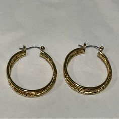 Gold Tone Hoop Earrings No Marking, Most Likely Gold Plated, Post Is Silver Tone Has A Twisted Strand Hoop With One Textured Hoop And One Smooth 1” Diameter Excellent Condition, Appear Unworn Gold-tone Metal Hoop Earrings, 14k Gold-tone Hoop Earrings, Gold Hoop Earrings With Gold-tone Hardware, Tarnish-resistant Gold-tone Brass Hoop Earrings, Gold-tone Polished Metal Hoop Earrings, Green Amethyst Earrings, Natural Pearl Earrings, Mickey Mouse Earrings, Prom Earrings