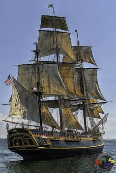 an old fashioned sailing ship in the ocean