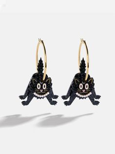 Get your claws on our Purrfectly Spooky Cat Earrings. These black cat hoops feature charming layered details from head to tail, adding a bewitching touch to your Halloween looks. Meow-gical and playfully chic, they're sure to be a purrfect hit all spooky season long. Black Novelty Jewelry For Party, Novelty Black Jewelry For Party, Trendy Cat Design Jewelry For Parties, Trendy Cat Design Jewelry For Party, Spooky Black Earrings For Party, Trendy Black Jewelry With Cat Design, Party Jewelry With Cat Design And Cat Ears, Novelty Black Earrings For Party, Novelty Black Party Earrings