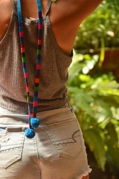 The hair wrap will allow you to put your hair back with style. Pom poms decorate the bottom of these hair accessories in bright colors, making any outfit fun. Putting your hair back during summer heat will be fun and stylish with this set of two hair wraps. With the purchase of this product, you will receive two hair wraps of your choice. Guatemalan Textiles, Colorful Headbands, Backstrap Loom, Hair Back, Hair Wraps, Weaving Process, Kits For Kids, Summer Heat, Kids Hats