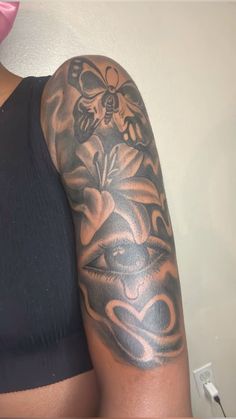 a woman with a tattoo on her arm