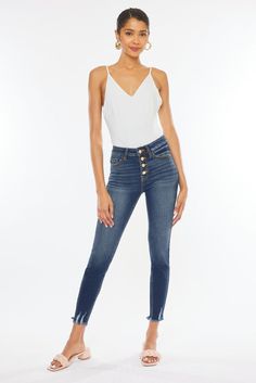 Our Jenny ankle skinny jeans are the perfect skinnies to add to your collection! Features beautiful fading, whiskering, a raw frayed hem with slight distress detail. These jeans also come with an elegant rose gold button fly and a regular 5 pocket design. Regular 5 pockets, Single button front closure, Zip fly 9.5" Rise / 27.5" Inseam (Size 5/26) 74% Cotton, 15% Polyester, 10% Rayon, 1% Spandex Model in size 25 Style # : KC9142D Stretchiness Level >> Stretch Mid-rise Denim Jeggings With Frayed Hem, Mid-rise Medium Wash Jeggings With Frayed Hem, Distressed Mid-rise Fitted Jeggings, Distressed High Rise Jeggings, Trendy High Waist Jeggings With Frayed Hem, Trendy Stretch Jeggings With Frayed Hem, High Waist Frayed Hem Jeggings For Spring, High Waist Jeggings With Frayed Hem For Spring, Spring High Waist Jeggings With Frayed Hem