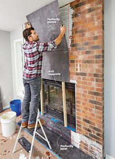 a man standing on a ladder in front of a brick fireplace with the words fire safety written on it