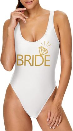 Dress to impress on your bachelorette getaway with our luxurious Bride Bachelorette One Piece Swimsuit. This elegant suit is perfect for a sophisticated and exclusive vibe. Its high quality design will make you feel like a work of art. Fabric Contents: 80% Nylon 20% Spandex White One Piece Swimsuit, Elegant Suit, Bride Bachelorette, White One Piece, Art Fabric, Winter Knit Hats, Boot Accessories, Winter Knits, Mens Sandals