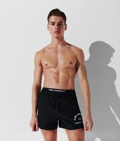 Level up your holiday wardrobe with these double waistband board shorts. The iconic Rue St-Guillaume logo at the left leg complete the practical yet statement style. Logo Waistband Summer Shorts, Casual Summer Bottoms With Logo Waistband, Summer Athleisure Bottoms With Logo Waistband, Casual Summer Shorts With Logo Waistband, Karl Lagerfeld Men, Elastic Shorts, Timeless Dress, Blouse Jeans, Holiday Wardrobe