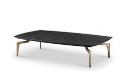 a black table with wooden legs on a white background in the shape of a coffee table