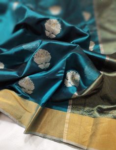 It's a beautiful Original chanderi handloom pure pattu soft silk saree . All over minakari teeli work jaal handmade nakshi border including running plane blouse. Saree length: 6.40m, width: 46in  [ saree 5.50m, blouse 90cm ] Dry clean only . Please note - color may be vary a little due to sunlight and photography . Please message us after purchasing in case you want fall and Pico done it not . No extra charges for fall and Pico but inform us . Blouse stitching is also available . Chanderi Saree, Festival Handloom Art Silk Pre-draped Saree, Semi-stitched Silk Saree With Border, Semi-stitched Silk Saree Fabric, Luxury Semi-stitched Silk Saree, Semi-stitched Katan Silk Saree With Pallu, Cheap Katan Silk Saree With Pallu Detail, Soft Silk Sarees, Indian Sarees