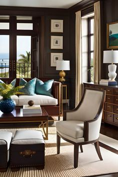 a living room filled with furniture next to a window covered in lots of light blue and white pillows