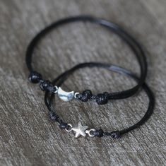 These lovely bracelets are made of waterproof cord and silver charms. Both bracelets are adjustable. Includes Gift Box. Matching Star Bracelets, Adjustable Gothic Bracelet For Streetwear, Adjustable Black Bracelet With Star Charm, Bracelet Pour Couple, Star Couple, Bracelets Couple, Bracelet Couple, Hollywood Fl, Couple Bracelets