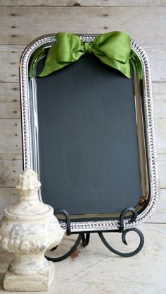 a small metal frame with a bow on it's head and the words, 50 easy crafts to make and sell