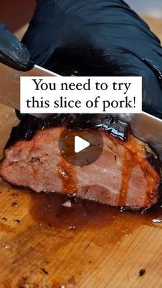 a person cutting meat with a knife on top of it that says, you need to try this slice of pork