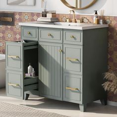 a bathroom vanity with drawers and a sink