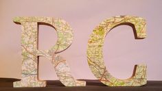 the letters are made out of maps and have been placed on top of each other