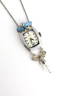 Give the gift that means you love the time you spend together, and that your live is timeless!!   This beautiful necklace is made from a repurposed men's Westclox watch, a vintage earring, filigree butterfly and a moonstone teardrop bead. The watch is not functional, and the crystal is missing.   It is handmade, and a one of a kind. Belt Buckle Jewelry, Present For Husband, Celtic Knot Jewelry, Vintage Assemblage Jewelry, Watch Pendant, Assemblage Necklace, Old Watches, Repurposed Jewelry, Assemblage Jewelry