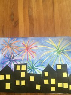 this is an art project for kids to do with paper and colored pencils that look like fireworks in the night sky