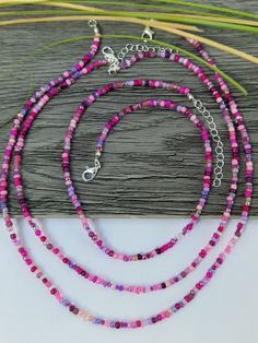 These lovely single strand beaded necklaces are great for adding a pop of colour. They are thin and dainty. Using 3mm beads they are randomly threaded so no 2 are alike.  The length (diameter) of the necklace is including the clasps and endings so please measure carefully to ensure you choose the correct length for yourself.  A 5cm extension chain can be added as well I do have other colour options available in my shop 😊 - This listing is for 1 necklace.  - Handmade in the UK - Made to Order Po Mixed Bead Necklace, Necklaces Pink, Mixed Beads Necklace, Violet Rose, Rose Violette, Purple Necklace, Necklace Beaded, Seed Bead Necklace, Beaded Necklaces