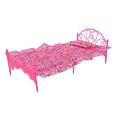 a pink bed with floral bedspread and matching headboard is shown in front of a white background