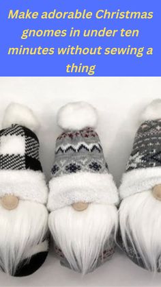 three knitted gnomes with white hair and beards on top of each other