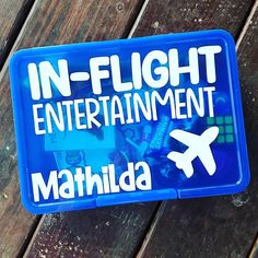 a blue sign that says in - flight entertainment