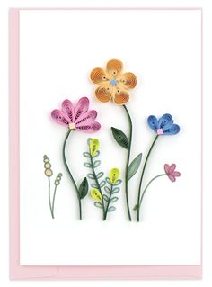 a card with three flowers and two butterflies on top of each other, one is made out of paper