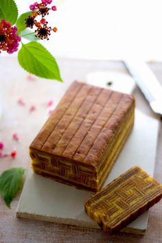 two slices of cake sitting on top of a table