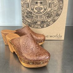 Zorba Tooled And Studded Leather Clogs By Five Worlds. 2" Wood Heel, 1" Platform. New In Box From Sundance. Originally $188, Asking $90 Brown Leather Clogs With Stitched Sole, Brown Leather Clogs With Woven Sole, Closed-toe Clogs With Calf Leather And Leather Sole, Brown Leather Non-slip Clogs, Leather Clogs With Branded Insole, Medium Width, Block Heel Mule, Slingback Mules, Kitten Heel Sandals, Wood Heel