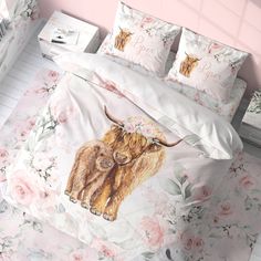 an image of a bed with flowers and animals on it