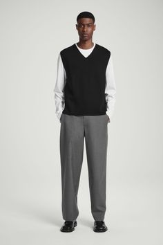 These directional pants sit on the more formal end of the COS menswear collection. Crafted from 100% wool-hopsack, they're shaped for a relaxed fit with wide, full-length legs and subtle side pleats. Style them with a shirt and a pair of Derbies.  Relaxed fitTailored waistband, back welt pocketCertified according to the Responsible Wool Standard, to protect the welfare of the sheep and their environment 100% RWS Wool / Dry clean Side seam length of size 32R is 41.85" / Model wears a size 32R Cos Menswear, Land Management, Menswear Collection, Trouser Suits, Derby, Sheep, Top Brands, Full Length, Dry Clean