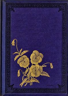 a blue book with gold flowers on it