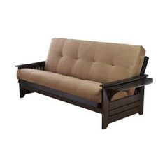 a futon sofa with brown cushions and wooden frame