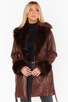 The Penny Lane Coat is a rock star's dream! This coat hits a bit above the knee, and has a faux fur collar, belt loops, and a detachable belt! Add some sass to any look with the Penny Lane coat! Partially lined Detachable belt Faux fur trim collar and cuff Face: 100% Polyurethane Back: 100% Polyester Lining: 100% Polyester Faux Fur: 100% Polyester Hand wash cold Model is wearing a size small White Dress Accessories, Penny Lane Coat, Penny Lane, Show Me Your Mumu, Swimwear Cover Ups, Faux Fur Collar, Swimwear Cover, Going Out Dresses, A Rock