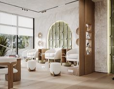 the interior of a salon with white chairs and mirrors