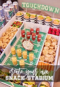 a football party with snacks and drinks on the sidelines, such as crackers