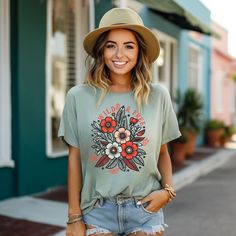 Looking for a cute versatile top to wear? Make sure to grab one of our Graphic tees! This soft and comfortable graphic tee is the perfect top for any outfit. It can be paired with biker shorts, jeans, or even a simple skirt/dress! This tee is true-to-size, so be sure to order your regular t-shirt size! If you are looking for a more oversized look, make sure to size up! Everyday Short Sleeve Printed Tops, Everyday Printed Graphic Tee Tops, Everyday Printed Short Sleeve Tops, Everyday Printed Graphic Tee, Printed Graphic Tee For Everyday, Everyday Printed Tops With Short Sleeves, Everyday Floral Print Graphic Tee Tops, Everyday Floral Print Crew Neck Top, Floral Print Crew Neck Top