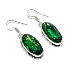 Make your look hypnotic and charming with this classy Earrings studded with Green Rutile featuring fascinating alluring 925 Sterling Silver finish. Stylish floral design make it flamboyant and elegant that you can wear it on parties or on a special event. ------------------------------------------ Welcome to Our Shop Silverstores ------------------------------------------ Rare Green Rutile Earrings, Gemstone Earrings, Green Drop & Dangle Earrings, 925 Sterling Silver Jewelry, Birthday Gift, Earr Channel Earrings, Rutile Crystal, Artistic Earrings, Mom Earrings, Silver Jewelry Wedding, 925 Earrings, Easter Earrings, Party Earrings, Earrings Green