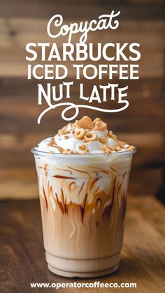 a cup of coffee with whipped cream and nuts on top