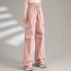 Style: Casual/Street/Vintage/Y2K/Punk/Hip PopFabric Content: CottonFit Type: Regular fitDesign: These casual pants shaped to a straight-leg fit, sits to a flattering waist with drawstring detail, with cargo pockets patched and long straps design. Casual Pink Wide Leg Bottoms, Trendy Full-length Pink Parachute Pants, Trendy Pink Full-length Parachute Pants, Casual High Waist Pink Cargo Pants, Baggy Straight Leg Pink Cargo Jeans, Pink Baggy Straight Leg Cargo Jeans, Pink Stretch Bottoms With Cargo Pockets, Pink Stretch Cargo Bottoms, Casual Mid-rise Pink Cargo Pants