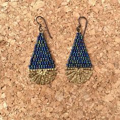 These carefully woven beaded earrings are inspired by the work of @thepacificthread. These earrings are very versatile and can be worn for work or a night out! They are made with gorgeous deep blue matte Japanese glass seed beads. The beads are woven onto hammered brass semi-circle frames and are finished with  high quality hypoallergenic niobium ear wires.  Nickel and lead free Length ~ 2 1/2 inches (6.35 cm) Width ~ 1 inch (2.54 cm) Blue Beaded Dangle Earrings In Brass, Blue Beaded Brass Dangle Earrings, Blue Brass Beaded Dangle Earrings, Blue Dangle Beaded Brass Earrings, Blue Beaded Brass Earrings, Artisan Blue Beaded Earrings With Tiny Beads, Adjustable Handwoven Blue Earrings, Bronze Bracelets, Bead Weaving Patterns