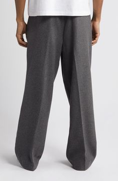 A roomy fit emphasizes the vintage spirit of pants tailored from a softly felted wool blend with flat-front construction and an easy, wear-everywhere feel. Exclusive retailer 30 1/2" inseam; 21" leg opening; 13 1/2" front rise; 20 1/2" back rise (size 32) Zip fly with button closure Front slant pockets; back button-welt pockets Adjustable buckle side tabs 50% wool, 40% polyester, 10% other fibers Machine wash, tumble dry Imported Casual Wool Pants With Straight Hem, Classic Full-length Wide Leg Pants For Winter, Classic Full Length Wide Leg Pants For Winter, Casual Wool Dress Pants With Welt Pockets, Gray Formal Wide Leg Full Length Pants, Wide Leg Wool Dress Pants For Fall, Gray Wide Leg Full Length Pants For Formal Occasions, Wool Wide-leg Business Pants, Business Wool Wide-leg Full-length Pants