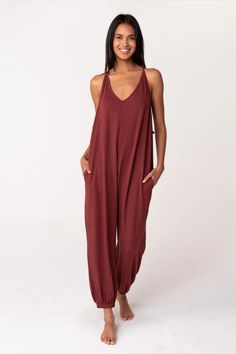 https://www.shoplovestitch.com/collections/new-arrivals-1/products/mazzy-jumpsuit?variant=39381651849294 Summer V-neck Jumpsuit With Tie Back, Trendy Cotton Jumpsuits And Rompers For Vacation, Lounging Jumpsuits And Rompers, Relaxed Fit Jumpsuits And Rompers For Loungewear, Relaxed Fit Overalls Jumpsuit For Loungewear, Relaxed Fit Overalls For Loungewear, Summer Solid Color Overall Jumpsuit/romper, Relaxed Fit Overalls And Jumpsuits For Lounging, Relaxed Fit Jumpsuits And Rompers For Lounging